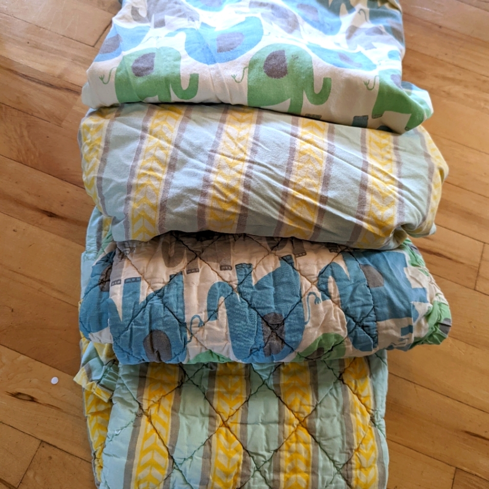Land of nod crib sheets and diaper changing sheets pads